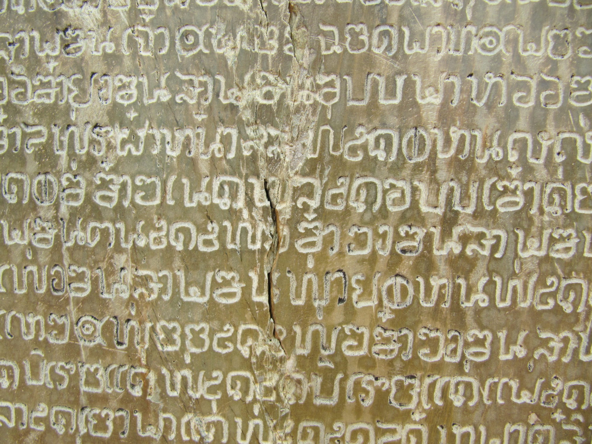 Thai writing engraved in stone
